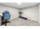Finished basement area featuring carpet flooring, neutral wall color and an exercise treadmill at 3716 Hamilton Dr, Gastonia, NC 28052
