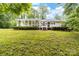 Charming ranch-style home featuring a lovely porch and lush, green landscaping at 3716 Hamilton Dr, Gastonia, NC 28052