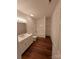 Bathroom features a vanity and a combined shower and tub with modern fixtures at 401 Constant Ln, Charlotte, NC 28722