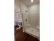 Bathroom features a vanity and a walk in shower with modern fixtures at 401 Constant Ln, Charlotte, NC 28722