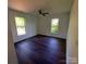 Bedroom features hardwood floors and natural light at 401 Constant Ln, Charlotte, NC 28722
