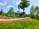 New construction home with a concrete walkway and landscaping at 401 Constant Ln, Charlotte, NC 28722