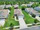 An overhead view of a house with a lush, well-maintained yard and vibrant landscaping at 4044 Murray St, Indian Land, SC 29707
