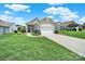 Charming single-story home featuring a two-car garage, manicured lawn, and inviting front porch at 4044 Murray St, Indian Land, SC 29707