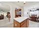 Spacious kitchen with white countertops, wood cabinets, and an open layout to the dining area at 4044 Murray St, Indian Land, SC 29707