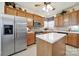 Bright kitchen features stainless steel appliances, a functional island, and plenty of cabinet space at 4044 Murray St, Indian Land, SC 29707