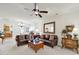 Cozy living room with leather sofas, wooden furniture, and ample natural light for a welcoming atmosphere at 4044 Murray St, Indian Land, SC 29707