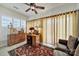 Living room featuring multiple windows, ceiling fan, and comfortable seating at 4044 Murray St, Indian Land, SC 29707