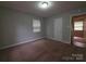 Bedroom with neutral paint and carpet, and a view of the closet at 409 Anne Ave, Waxhaw, NC 28173
