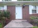 Charming brick house featuring a well-manicured lawn and inviting front entrance at 409 Anne Ave, Waxhaw, NC 28173