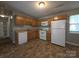 Inviting kitchen with appliances and plenty of counter space for food preparation at 409 Anne Ave, Waxhaw, NC 28173