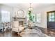 Elegant living room with fireplace, hardwood floors, and contemporary furnishings providing a cozy and stylish space at 501 E Tremont Ave, Charlotte, NC 28203