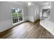 Inviting foyer with natural light, wood-look flooring, and staircase at 524 N Portman Ln, Fort Mill, SC 29708