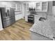Stylish kitchen featuring granite countertops and stainless steel appliances at 524 N Portman Ln, Fort Mill, SC 29708