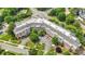 Drone shot of the building with lush greenery and sidewalks surrounding it at 5425 Closeburn Rd # 208, Charlotte, NC 28210