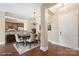 Elegant dining area with hardwood floors, chandelier, and neutral palette for sophisticated meals at 5425 Closeburn Rd # 208, Charlotte, NC 28210