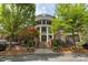 Welcoming building entrance with elegant columns, providing a grand and inviting access for residents and guests at 5425 Closeburn Rd # 208, Charlotte, NC 28210