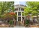 Stunning building featuring a circular design, balconies and landscaping at 5425 Closeburn Rd # 208, Charlotte, NC 28210