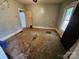 Bedroom featuring natural light, neutral paint, and vinyl floors at 562 W Wilson Ave, Mooresville, NC 28115