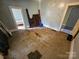 Bedroom featuring natural light, neutral paint, and vinyl floors at 562 W Wilson Ave, Mooresville, NC 28115