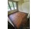 Bedroom features hardwood flooring and natural lighting at 562 W Wilson Ave, Mooresville, NC 28115