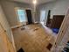 Bedroom featuring natural light, neutral paint, and vinyl floors at 562 W Wilson Ave, Mooresville, NC 28115