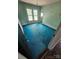 Bedroom features blue carpet, a window and green walls at 562 W Wilson Ave, Mooresville, NC 28115