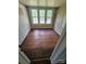 Bedroom features hardwood flooring and natural lighting at 562 W Wilson Ave, Mooresville, NC 28115