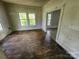 Room with hardwood floors, natural light, and neutral paint at 562 W Wilson Ave, Mooresville, NC 28115