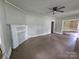 Cozy living room with a fireplace and hardwood floors at 562 W Wilson Ave, Mooresville, NC 28115
