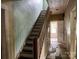 Traditional stairway features wooden banisters and leads to the upper level at 562 W Wilson Ave, Mooresville, NC 28115