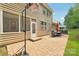 Backyard patio featuring a basketball hoop and an outdoor dining set at 5812 Dinsmore Ln, Belmont, NC 28012