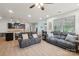Open-concept living room with views of the dining area and modern kitchen at 5812 Dinsmore Ln, Belmont, NC 28012