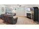 Comfortable living room features hardwood floors, a fireplace, and plenty of natural light at 5812 Dinsmore Ln, Belmont, NC 28012