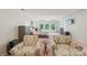 Expansive main bedroom featuring a sitting area, abundant natural light, and plush carpet, ideal for relaxation and comfort at 5812 Dinsmore Ln, Belmont, NC 28012