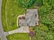 Aerial view of a well-maintained house featuring a large roof and a private backyard deck at 5826 Natoma Rd, Lake Wylie, SC 29710