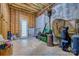 Unfinished basement with exposed framing, concrete wall, and walkout to the back yard at 5826 Natoma Rd, Lake Wylie, SC 29710