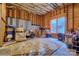 Unfinished basement space with exposed wood framing, concrete wall and natural light at 5826 Natoma Rd, Lake Wylie, SC 29710