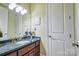 Bathroom featuring granite countertop, neutral walls, and framed mirror at 5826 Natoma Rd, Lake Wylie, SC 29710