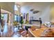 Elegant living room with hardwood floors, high ceilings, large windows, and stylish decor at 5826 Natoma Rd, Lake Wylie, SC 29710