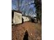 Home exterior, needs significant renovations, featuring a large backyard at 722 S Weldon St, Gastonia, NC 28052
