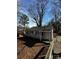 Charming single-story home with a covered porch and a pathway through the front yard at 722 S Weldon St, Gastonia, NC 28052