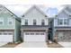 Charming two-story home with a brick and siding exterior and an attached two-car garage at 7416 Hartsfield Dr, Lancaster, SC 29720
