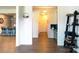 A hallway transitions to an office and kitchen offering views throughout the home at 7416 Hartsfield Dr, Lancaster, SC 29720