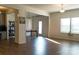 A living room transitions to an office and dining area featuring light and bright spaces at 7416 Hartsfield Dr, Lancaster, SC 29720