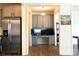 A kitchen view to an office featuring built-in cabinets and a desktop workspace at 7416 Hartsfield Dr, Lancaster, SC 29720