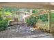 View of the backyard featuring a deck, fenced in area, and mature landscaping at 8504 Knollwood Cir, Charlotte, NC 28213