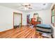 Spacious bedroom featuring wood floors, a closet and natural light at 8504 Knollwood Cir, Charlotte, NC 28213