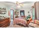 Inviting bedroom featuring a ceiling fan, and a view to the ensuite bathroom at 8504 Knollwood Cir, Charlotte, NC 28213