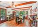 Bright dining room with wood floors, exposed beams, and natural light at 8504 Knollwood Cir, Charlotte, NC 28213